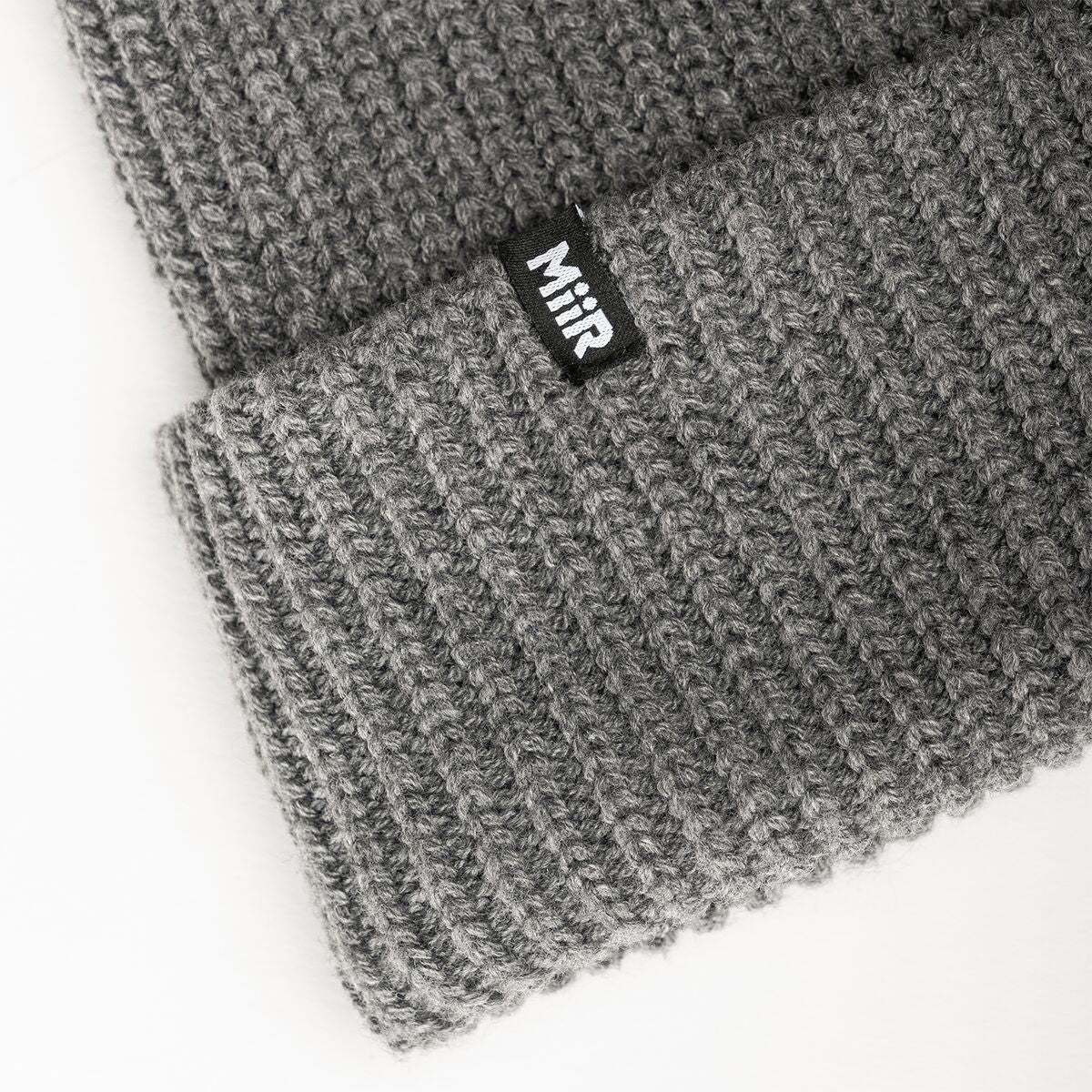jodie-williams-beanie-e0 WebPDP-RecycledPolyRibBeanie_Studio_TagDetail_GrayHeather__BNE002400OS.jpg